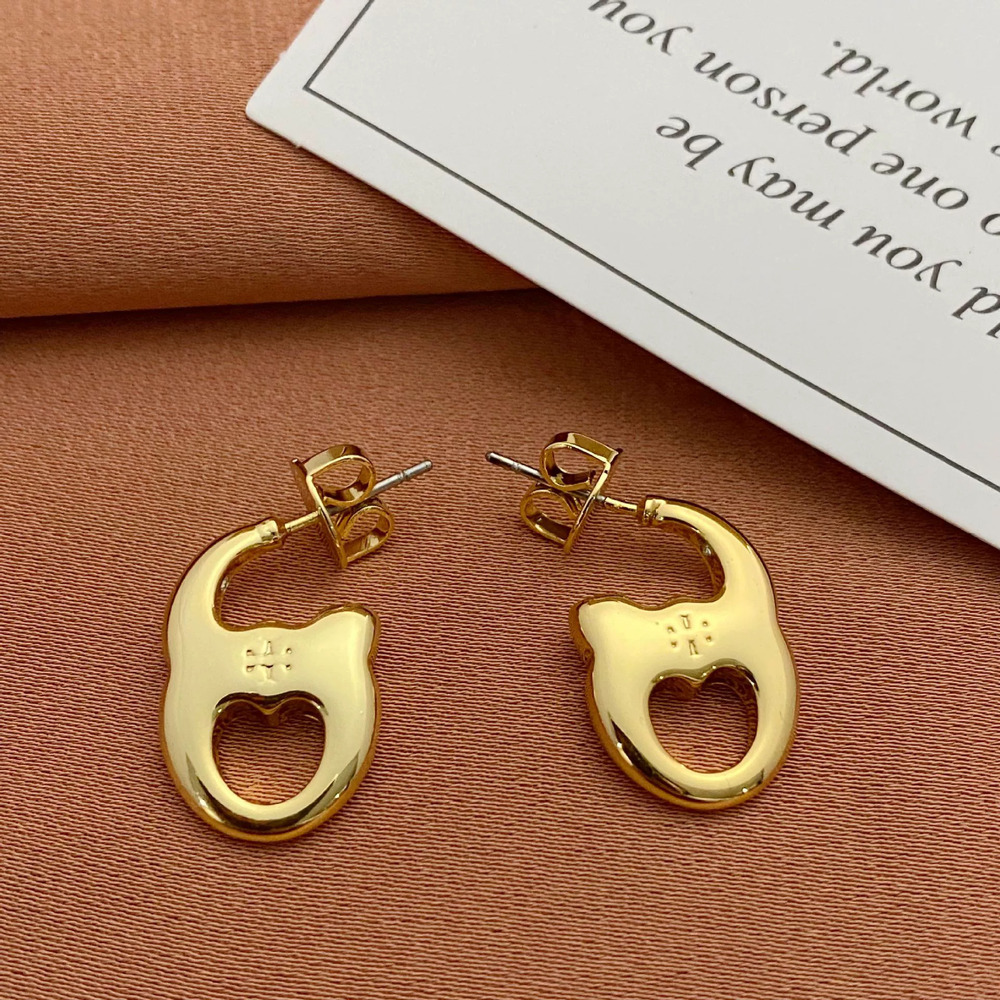 Tory Burch Pig Snout Earrings Metal